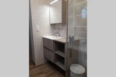 Salle de bains dans l'établissement La Rose des Vents Côte des Isles