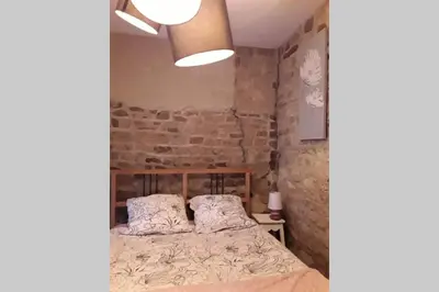 Un ou plusieurs lits dans un hébergement de l'établissement Gîte à la campagne 2