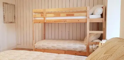 Un ou plusieurs lits dans un hébergement de l'établissement Gîte Lucian Mont-saint-michel