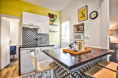 Cuisine ou kitchenette dans l'établissement La Maison de Pêcheur de Ginette