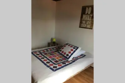 Un ou plusieurs lits dans un hébergement de l'établissement Votre appartement à 200m de la plage