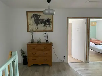 Un ou plusieurs lits dans un hébergement de l'établissement Maison en pleine nature proche plage Omaha Beach!