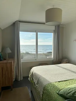 Un ou plusieurs lits dans un hébergement de l'établissement Villa Denise Petit Gîte