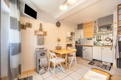 Cuisine ou kitchenette dans l'établissement Le ptit passage