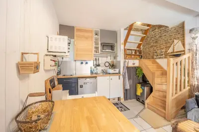 Cuisine ou kitchenette dans l'établissement Le ptit passage