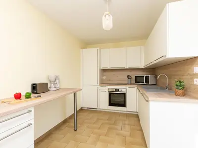 Cuisine ou kitchenette dans l'établissement Holiday Home La Grève by Interhome
