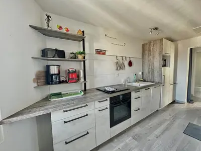 Cuisine ou kitchenette dans l'établissement Appartement près du port centre et plage - Vue mer