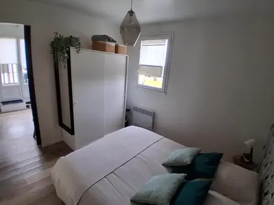 Un ou plusieurs lits dans un hébergement de l'établissement Appartement avec terrasse, Cosy et Moderne - à deux pas de la plage !