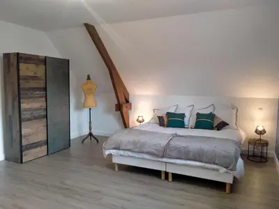 Un ou plusieurs lits dans un hébergement de l'établissement Le Gîte du Haras d'Havetot