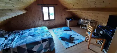 Un ou plusieurs lits dans un hébergement de l'établissement CHALET BORD DE MER