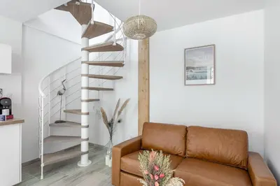Coin salon dans l'établissement Le Coco de Cancale - Duplex proche mer