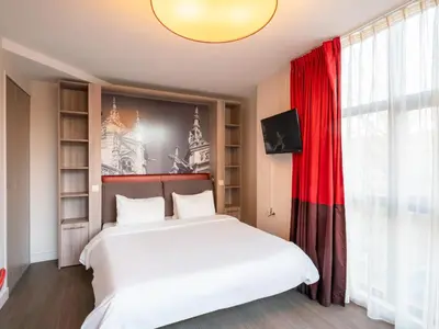 Un ou plusieurs lits dans un hébergement de l'établissement B&B HOME Caen Centre Gare