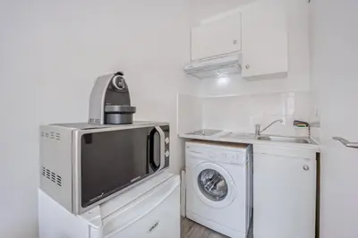 Cuisine ou kitchenette dans l'établissement Le Petit Normand - Studio avec jardin à 500 m de la plage
