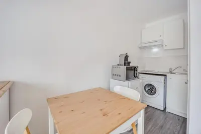 Cuisine ou kitchenette dans l'établissement Le Petit Normand - Studio avec jardin à 500 m de la plage
