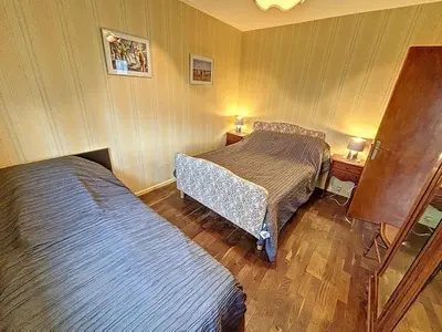 Un ou plusieurs lits dans un hébergement de l'établissement Maison de vacances avec jardin clos à 150m de la plage, idéale pour familles - FR-1-361-389