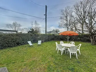 Jardin de l'établissement Maison de vacances avec jardin clos à 150m de la plage, idéale pour familles - FR-1-361-389