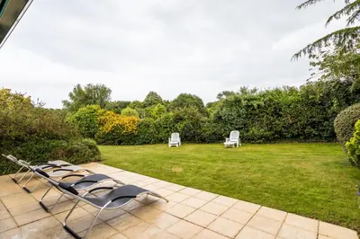 Jardin de l'établissement La Déferlante - Maison familiale à Cancale