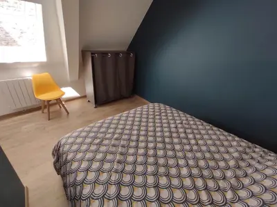 Un ou plusieurs lits dans un hébergement de l'établissement Appartement 5 Cherbourg centre avec NETFLIX et WIFI