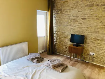 Un ou plusieurs lits dans un hébergement de l'établissement Maison de pêcheur de 1820 au cœur du bourg - 3 étoiles