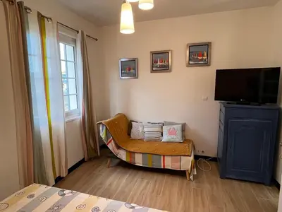 Télévision ou salle de divertissement dans l'établissement Maison de vacances VUE MER ET CANAL