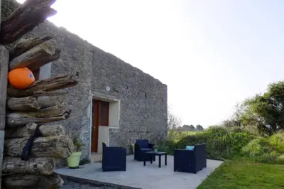 Coin salon dans l'établissement Gite au pied des dunes, 200m de la plage