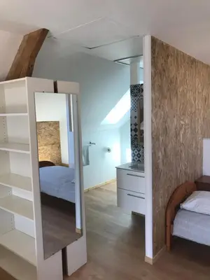 Un ou plusieurs lits dans un hébergement de l'établissement Fakarava, gîte en ville au calme