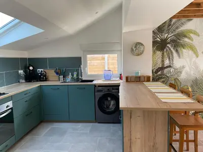 Cuisine ou kitchenette dans l'établissement Charmante maison à deux pas de la mer
