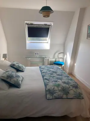 Un ou plusieurs lits dans un hébergement de l'établissement chambre d'hôtes Le Domaine de la Vallée