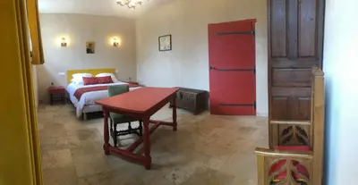 Un ou plusieurs lits dans un hébergement de l'établissement chambre d'hôtes Le Domaine de la Vallée
