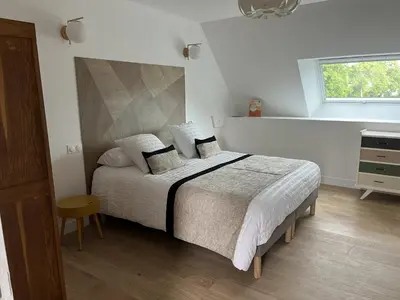 Un ou plusieurs lits dans un hébergement de l'établissement chambre d'hôtes Le Domaine de la Vallée