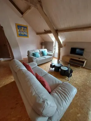 Télévision ou salle de divertissement dans l'établissement Gite de la Motte