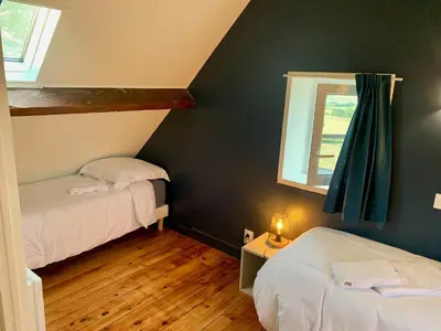 Un ou plusieurs lits dans un hébergement de l'établissement Maison de charme vue sur mer pour 6 pers