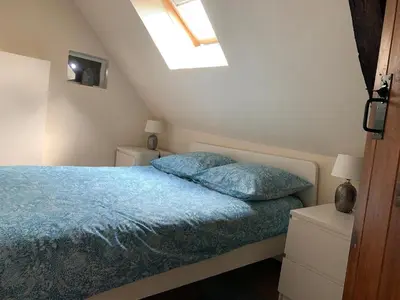 Un ou plusieurs lits dans un hébergement de l'établissement Le Bas Chesnay Gîte Domfront en Poiraie