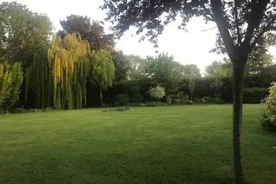 Jardin de l'établissement Studio meublé près des plages du débarquement