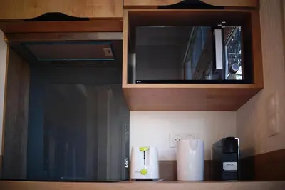 Cuisine ou kitchenette dans l'établissement Normand'Histoire Gite 1869