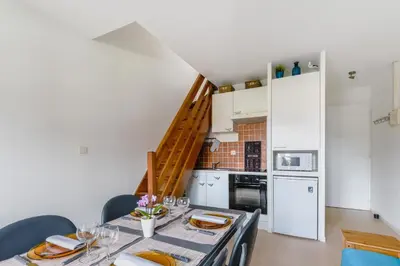 Cuisine ou kitchenette dans l'établissement Le Voilier