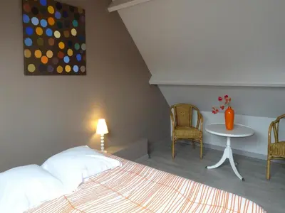 Un ou plusieurs lits dans un hébergement de l'établissement Holiday Home in Portbail near Sandy Beach