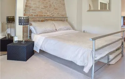 Un ou plusieurs lits dans un hébergement de l'établissement Holiday Home Lieu Dit La Riviere