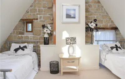 Un ou plusieurs lits dans un hébergement de l'établissement Holiday Home Lieu Dit La Riviere