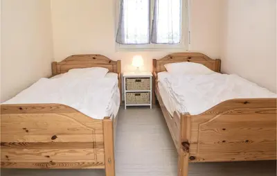 Un ou plusieurs lits dans un hébergement de l'établissement Gorgeous Home In St Marcouf De L'isle