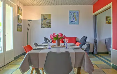 Coin salon dans l'établissement Holiday Home In Montsernelle