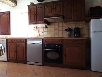 Cuisine ou kitchenette dans l'établissement GITE AVEL BREIZH