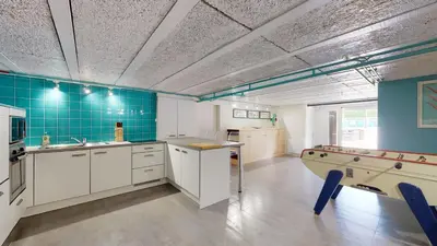 Cuisine ou kitchenette dans l'établissement Villa Amare Granville