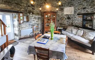 Coin salon dans l'établissement Beautiful Home In Cherrueix