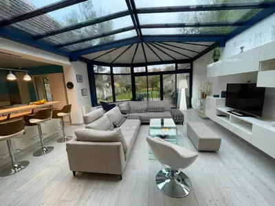 Télévision ou salle de divertissement dans l'établissement Balaena - maison avec jardin proche plage