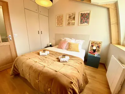 Un ou plusieurs lits dans un hébergement de l'établissement Le Capella, magnifique maison au calme avec garage