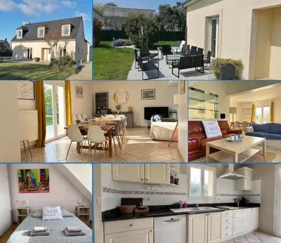 Cuisine ou kitchenette dans l'établissement Villa des pontons Maison 5 chambres avec grand jardin clos et belle terrasse séjour spacieux lumineux à 2 kms de la plage d'Arromanches près de Bayeux, Omaha beach - table de ping pong - garage