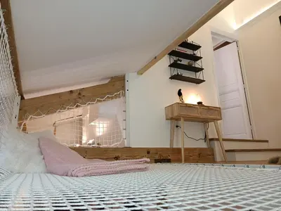 Un ou plusieurs lits dans un hébergement de l'établissement Le Maréchal Duplex - Appartement avec Jacuzzi - CAEN hyper Centre