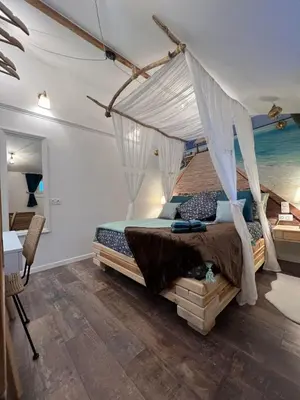 Un ou plusieurs lits dans un hébergement de l'établissement Le Maréchal Duplex - Appartement avec Jacuzzi - CAEN hyper Centre