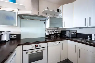 Cuisine ou kitchenette dans l'établissement La Plage - appartement vue mer